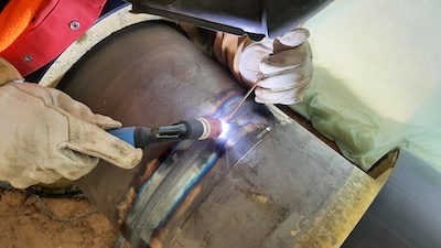 Tig welder uses a filler rod while joining sections